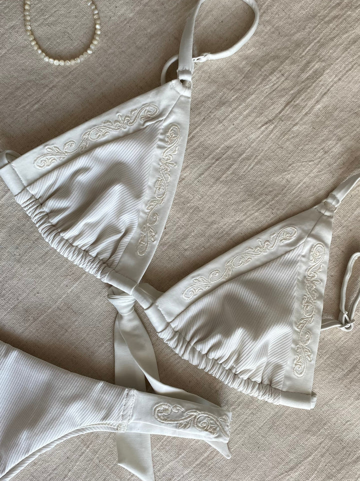 Bikini top triangle with brazilian tanga bottom in ivory-white with rib fabric and embroidery