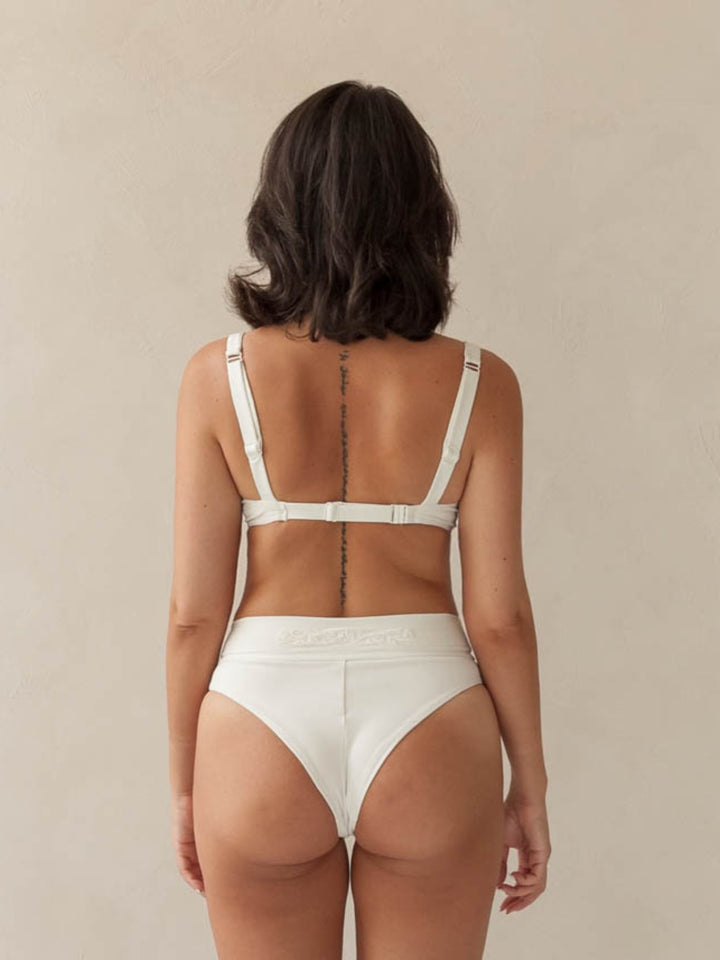 Bikini-top-balcony-underwire-and-high-waist-bottom-ivory-white-with-rib-fabric-and-embroidery-woman-back-close-up